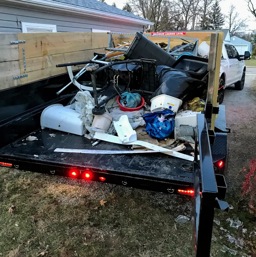 Roll-off dumpster delivered to a residential driveway in Winston